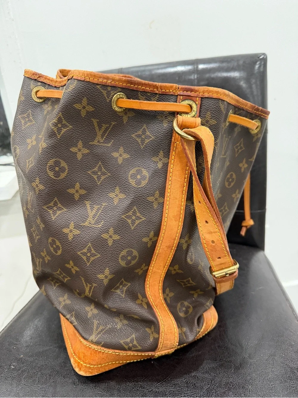 Louis Vuitton Monogram Drawstring Hobo in Brown and Tan